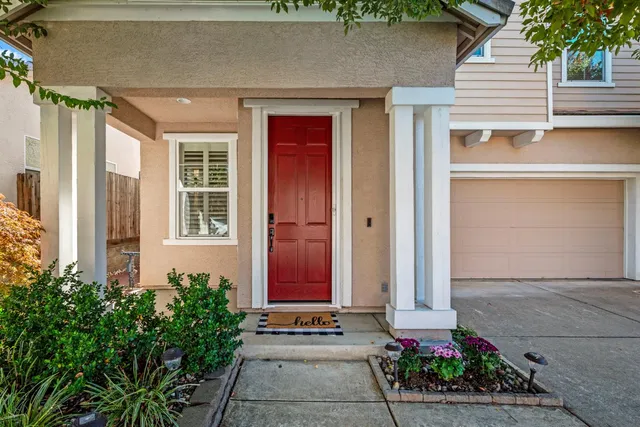 a front view of building with yard