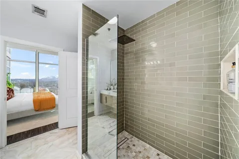 a bathroom with a sink and a shower