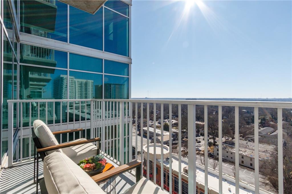 250 Pharr Road Northeast, Unit 1116 Atlanta, GA 30305 - Photo 27 of 45 a view of a balcony with chair
