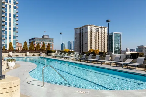a view of city with tall buildings