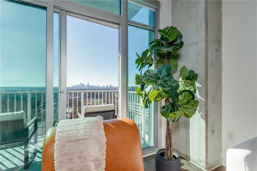 250 Pharr Road Northeast, Unit 1116 Atlanta, GA 30305 - Photo 10 of 45 a vase of flowers sitting on a table