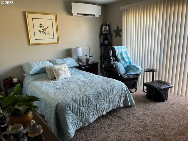 368 Cambridge Street Springfield, OR 97477 - Photo 12 of 25 a bedroom with a bed and a couch