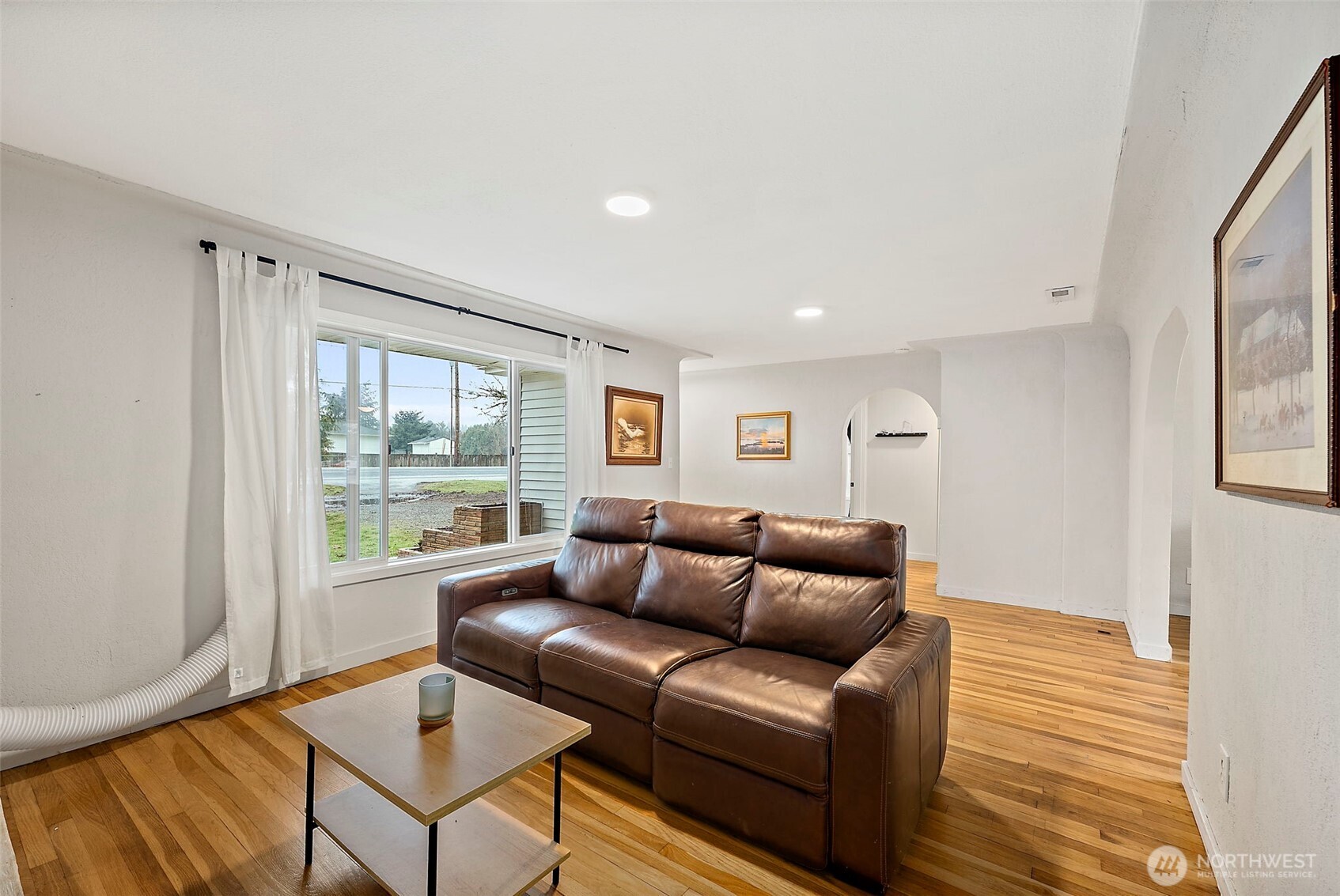 2949 South Bay Road Northeast Olympia, WA 98506 - Photo 13 of 29 a living room with furniture and a window