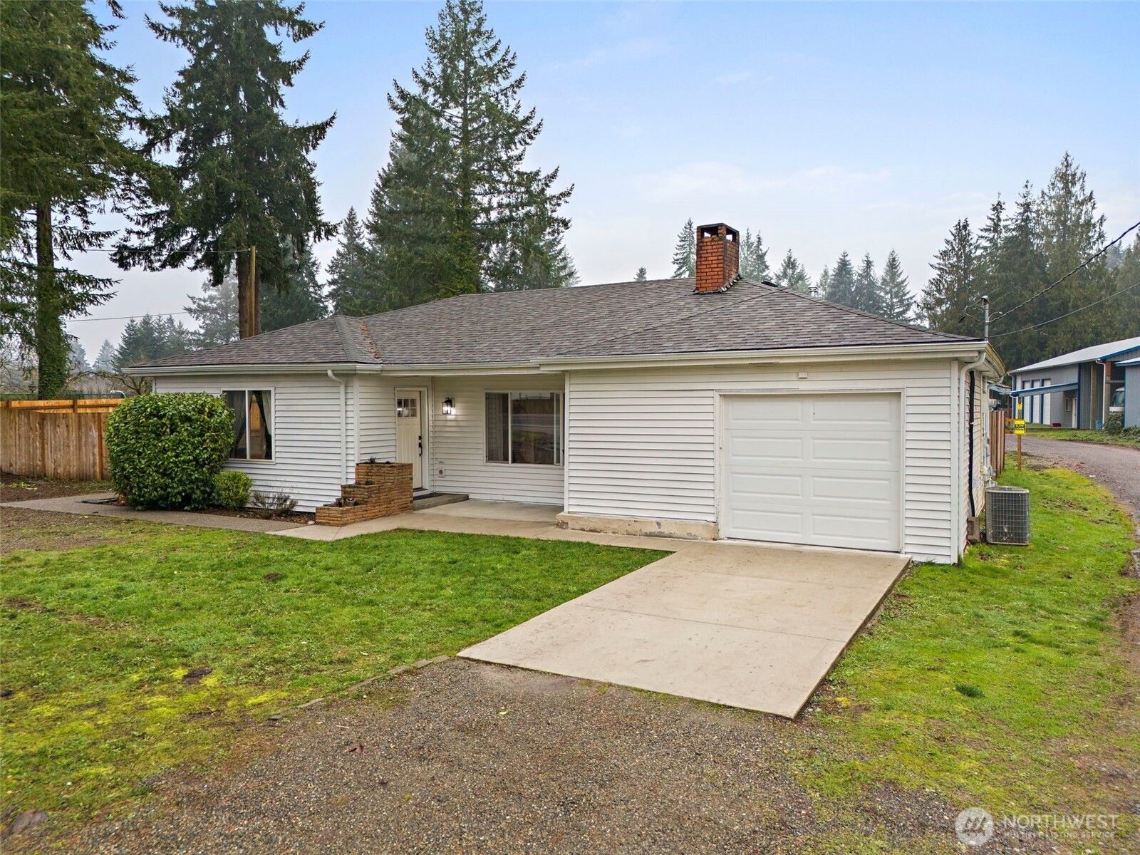 2949 South Bay Road Northeast Olympia, WA 98506 - Photo 2 of 29 a front view of house with yard and trees