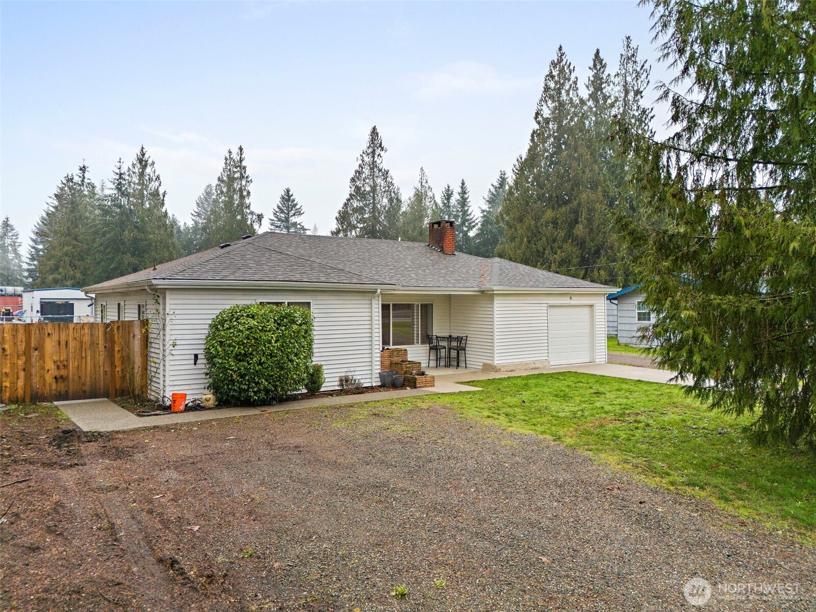 2949 South Bay Road Northeast Olympia, WA 98506 - Photo 3 of 29 a view of a house with a yard and garage