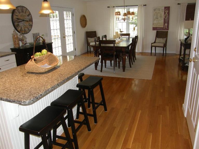 9 Shady Lane Chatham, MA 02633 - Photo 4 of 15 a view of a dining room with furniture and window