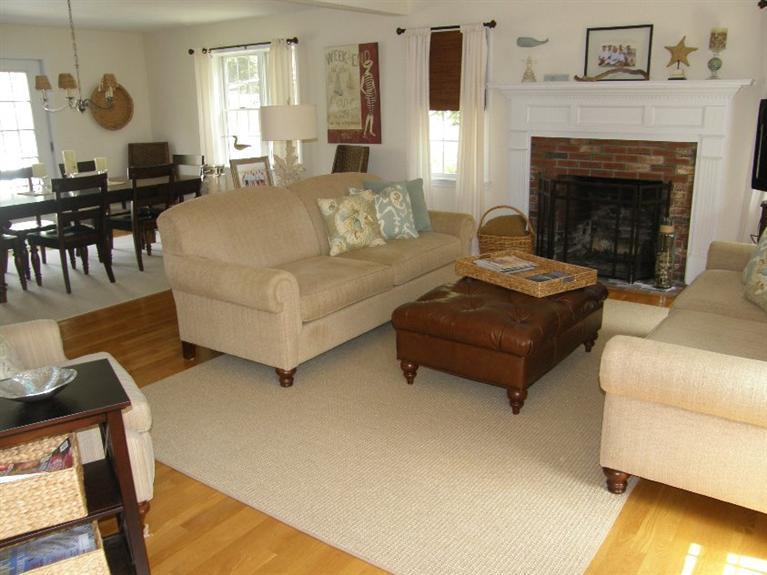 9 Shady Lane Chatham, MA 02633 - Photo 7 of 15 a living room with furniture and a fireplace