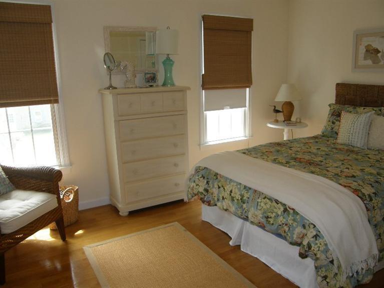 9 Shady Lane Chatham, MA 02633 - Photo 8 of 15 a bedroom with a bed and a window