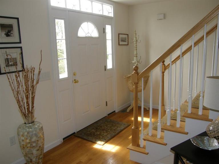 9 Shady Lane Chatham, MA 02633 - Photo 9 of 15 a view of a livingroom with furniture and floor to ceiling window