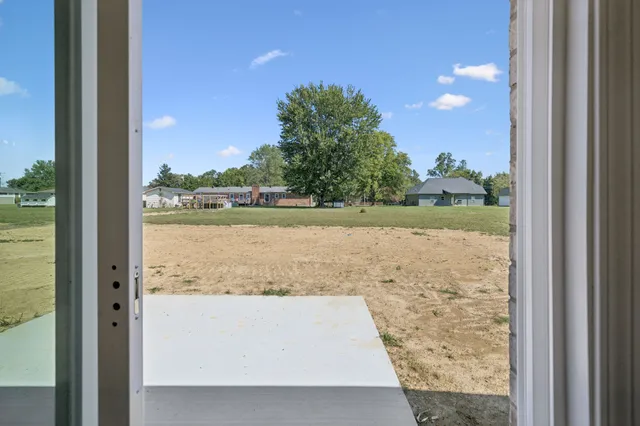 a view of a lake from a window
