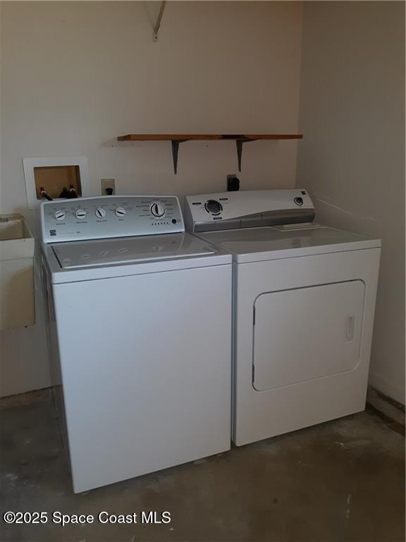 641 Barber Street Sebastian, FL 32958 - Photo 13 of 15 a utility room with dryer and washer