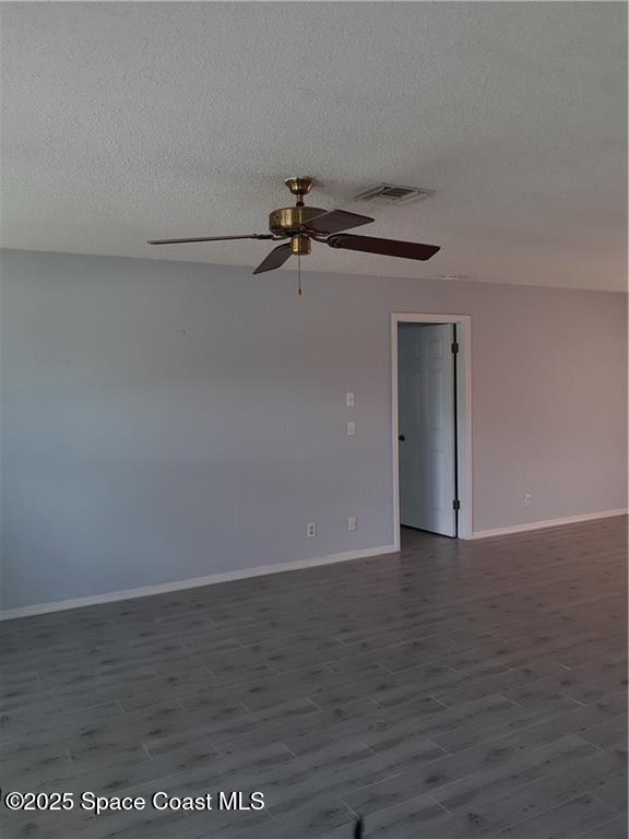 641 Barber Street Sebastian, FL 32958 - Photo 7 of 15 a view of a room with wooden floor