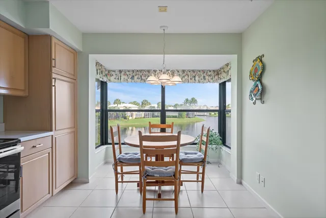 a kitchen with granite countertop cabinets and stainless steel appliances