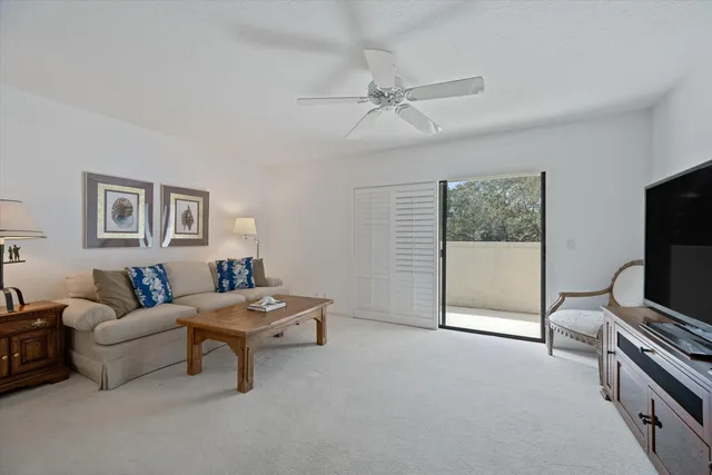 a bedroom with two beds and painted walls