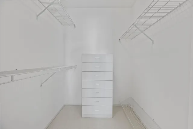 a bathroom with a shower and a bath tub