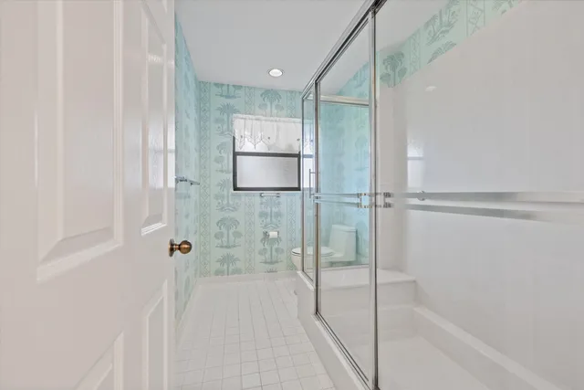 a room filled with furniture and white walls