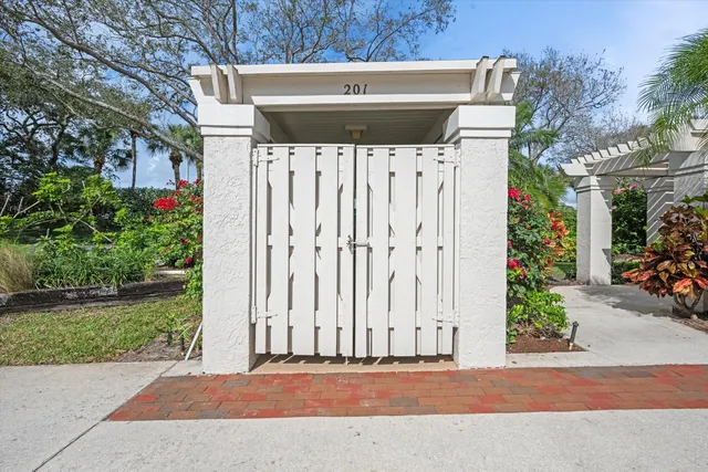 a view of swimming pool with seating space