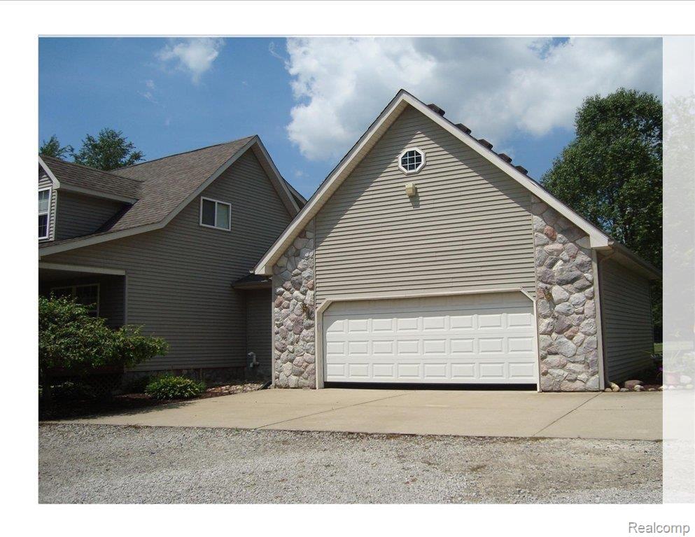 2825 Fenton Road Hartland, MI 48353 - Photo 14 of 14 Attached Oversized 2 Car Garage
