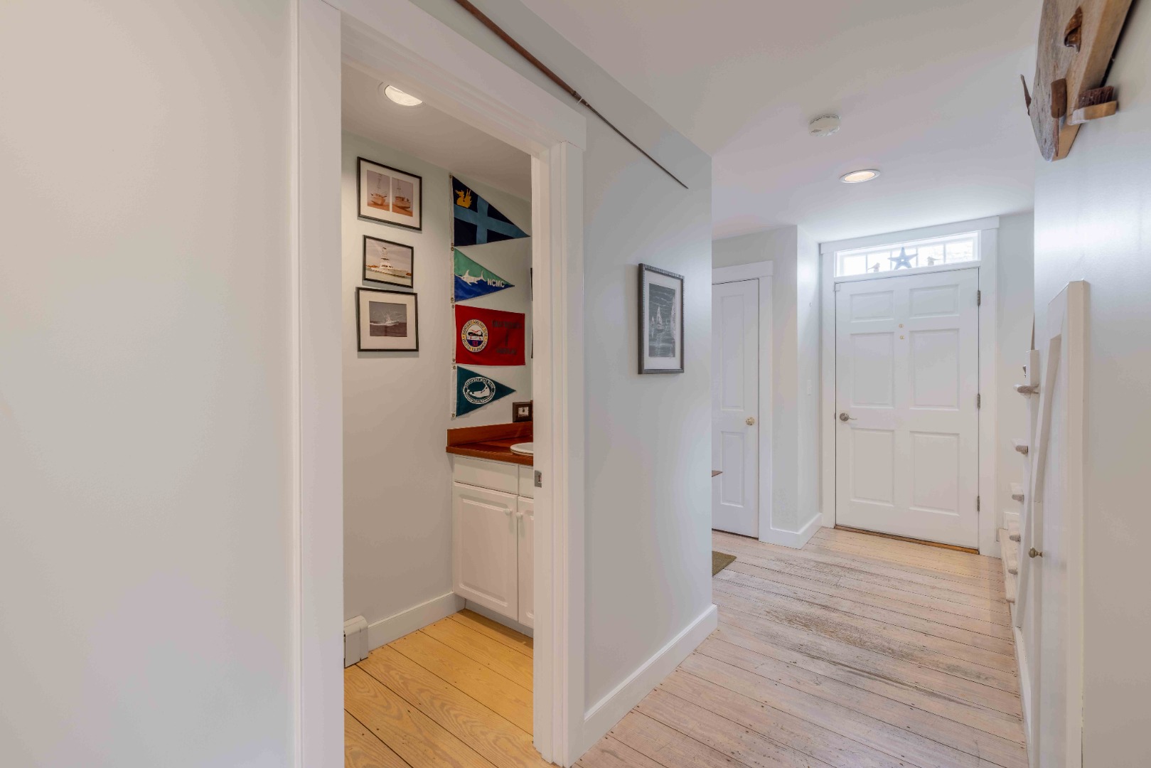 15 Goldfinch Drive Nantucket, MA 02554 - Photo 9 of 19 a view of a hallway with wooden floor and closet