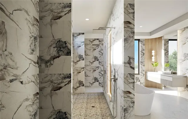 a bathroom with a bathtub and shower