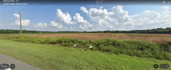 a view of a lake in middle of the house
