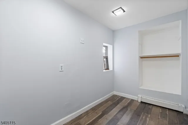 a view of small space with wooden floor