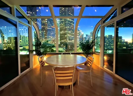 a view of swimming pool with a lounge chair