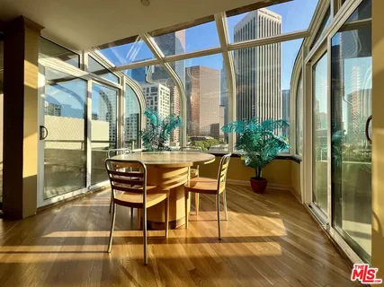 a patio with table and chairs