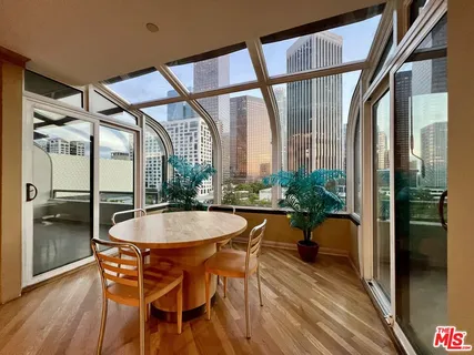 a patio with yard and outdoor seating