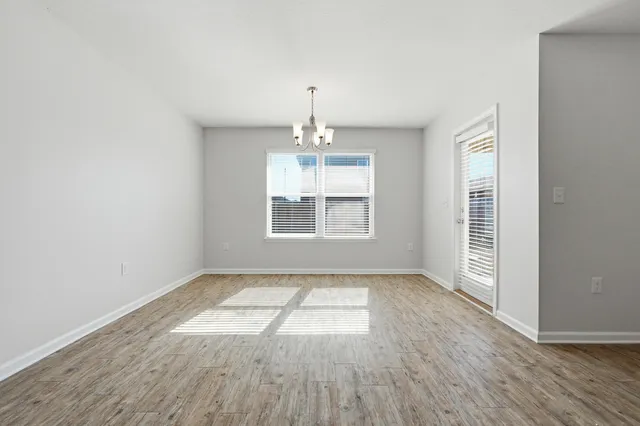 a white bath tub sitting next to a window
