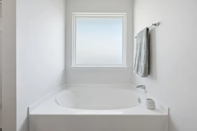 a bathroom with a sink and a bathtub