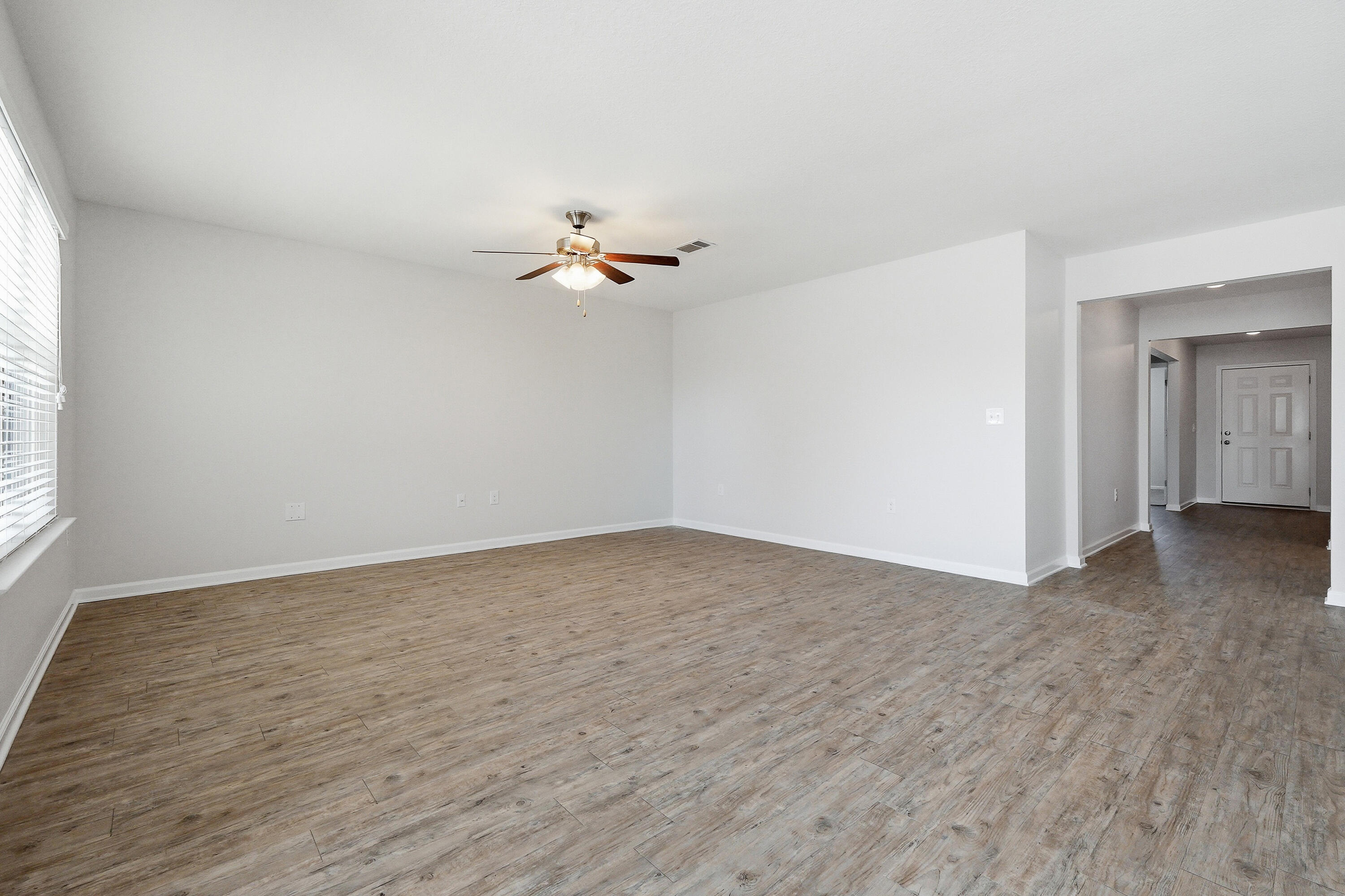 727 Widgeon Way Crestview, FL 32539 - Photo 3 of 4 a view of an empty room with a window