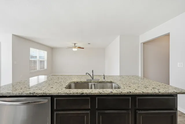 a kitchen with a sink and a sink