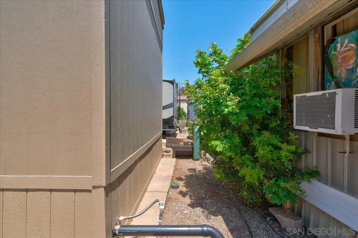 7495 Oakland Road, Unit 32 La Mesa, CA 91942 - Photo 13 of 16 a path view of green space