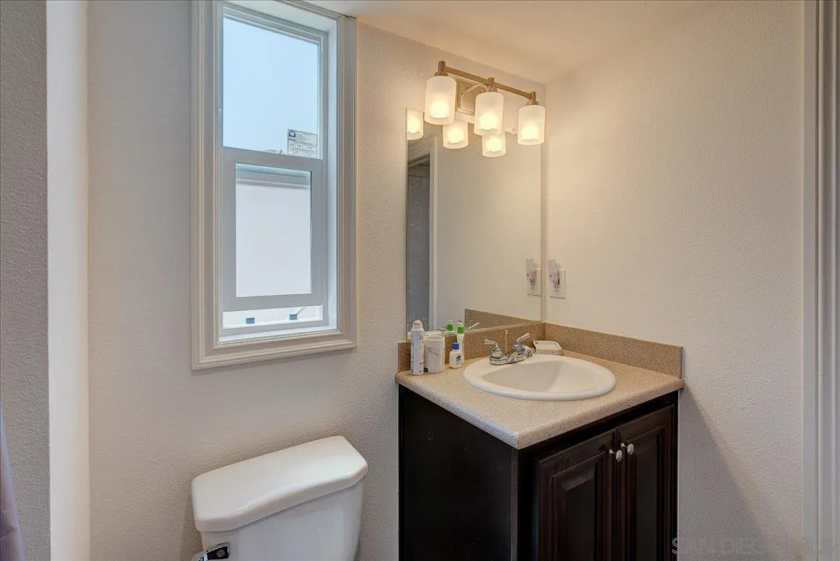 7495 Oakland Road, Unit 32 La Mesa, CA 91942 - Photo 7 of 16 a bathroom with a sink and a toilet