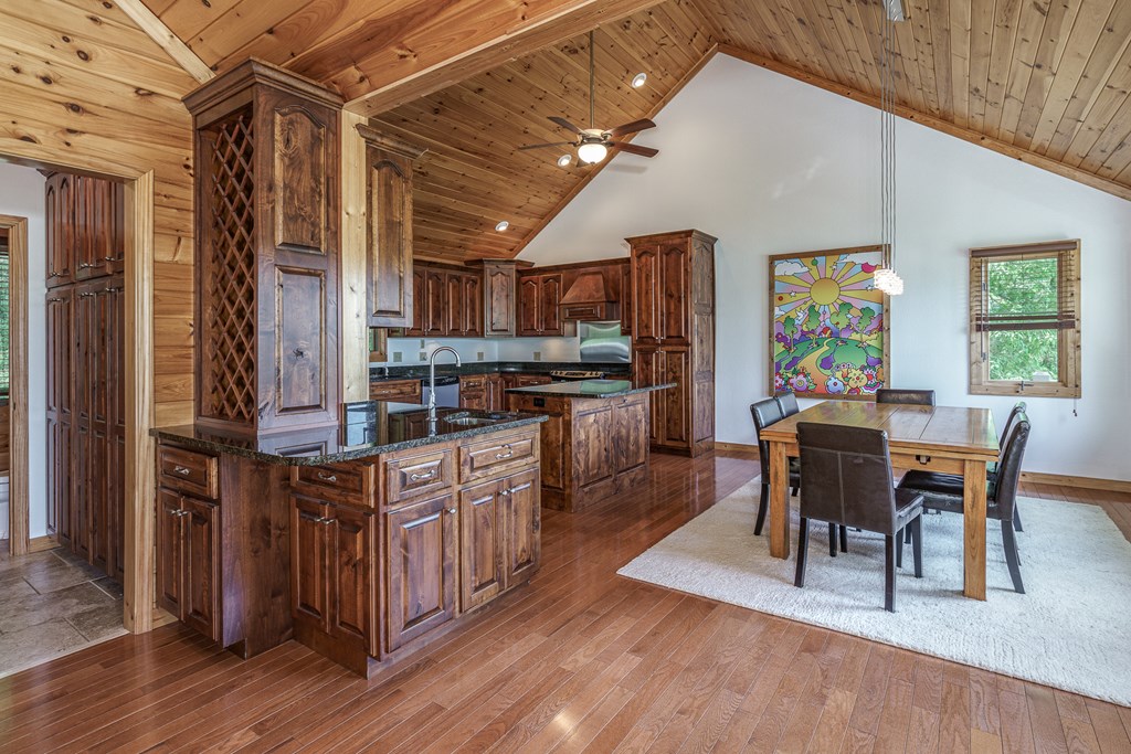 509 Lonesome Pine Road Murphy, NC 28906 - Photo 12 of 70 a open kitchen with stainless steel appliances granite countertop a stove and a refrigerator