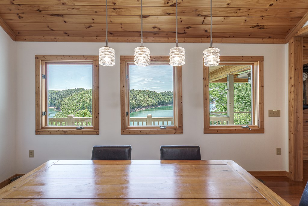 509 Lonesome Pine Road Murphy, NC 28906 - Photo 17 of 70 a view of a room with windows and chandelier