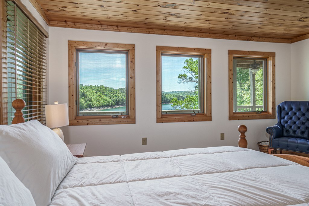 509 Lonesome Pine Road Murphy, NC 28906 - Photo 32 of 70 a bedroom with a bed and a window