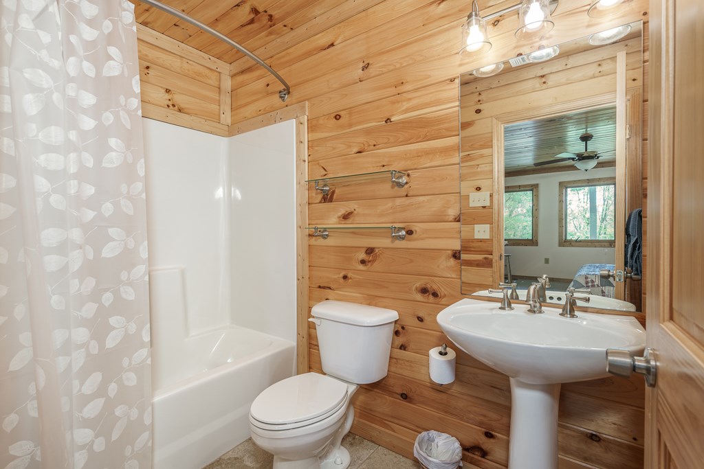 509 Lonesome Pine Road Murphy, NC 28906 - Photo 36 of 70 a bathroom with a sink a toilet and shower
