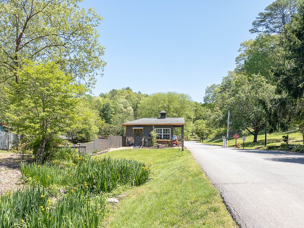 509 Lonesome Pine Road Murphy, NC 28906 - Photo 54 of 70 a view of house with swimming pool and sitting area