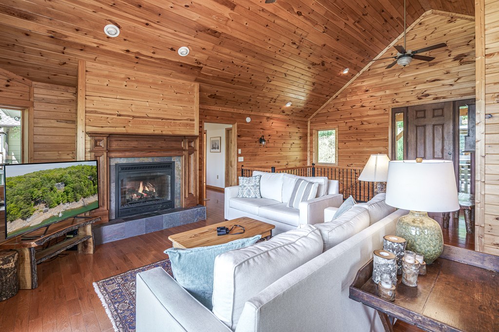 509 Lonesome Pine Road Murphy, NC 28906 - Photo 7 of 70 a living room with furniture and a fireplace