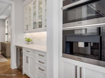 a spacious bathroom with a granite countertop sink a toilet and shower