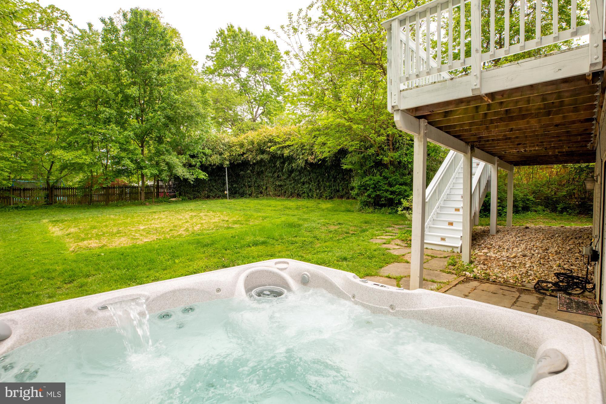 4052 Hunt Road Fairfax, VA 22032 - Photo 40 of 49 Hot tub, deck and backyard