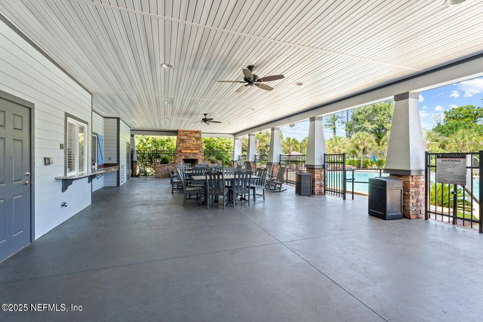15672 Tisons Bluff Road Jacksonville, FL 32218 - Photo 36 of 42 a lobby with furniture and a large window