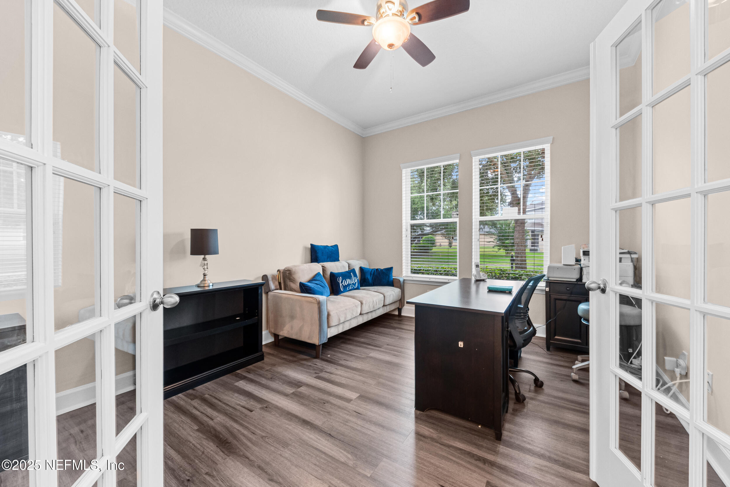 15672 Tisons Bluff Road Jacksonville, FL 32218 - Photo 10 of 42 a living room with furniture and windows