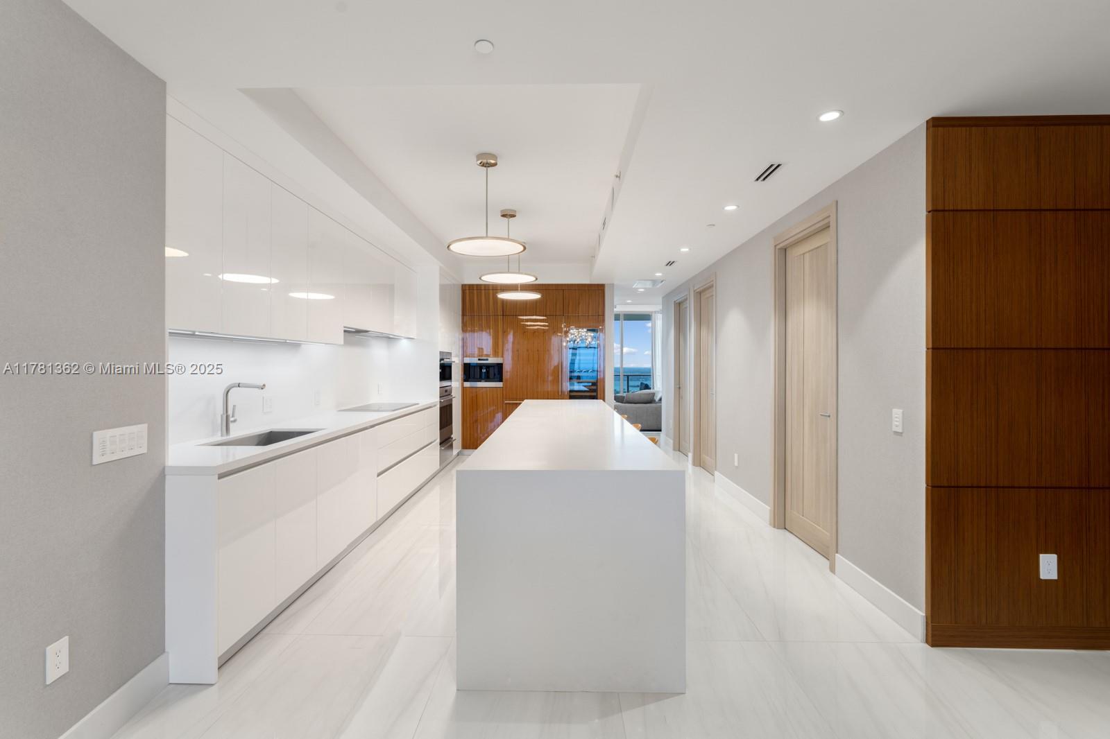 9705 Collins Avenue, Unit 2604N Bal Harbour, FL 33154 - Photo 13 of 42 a view of a kitchen and refrigerator