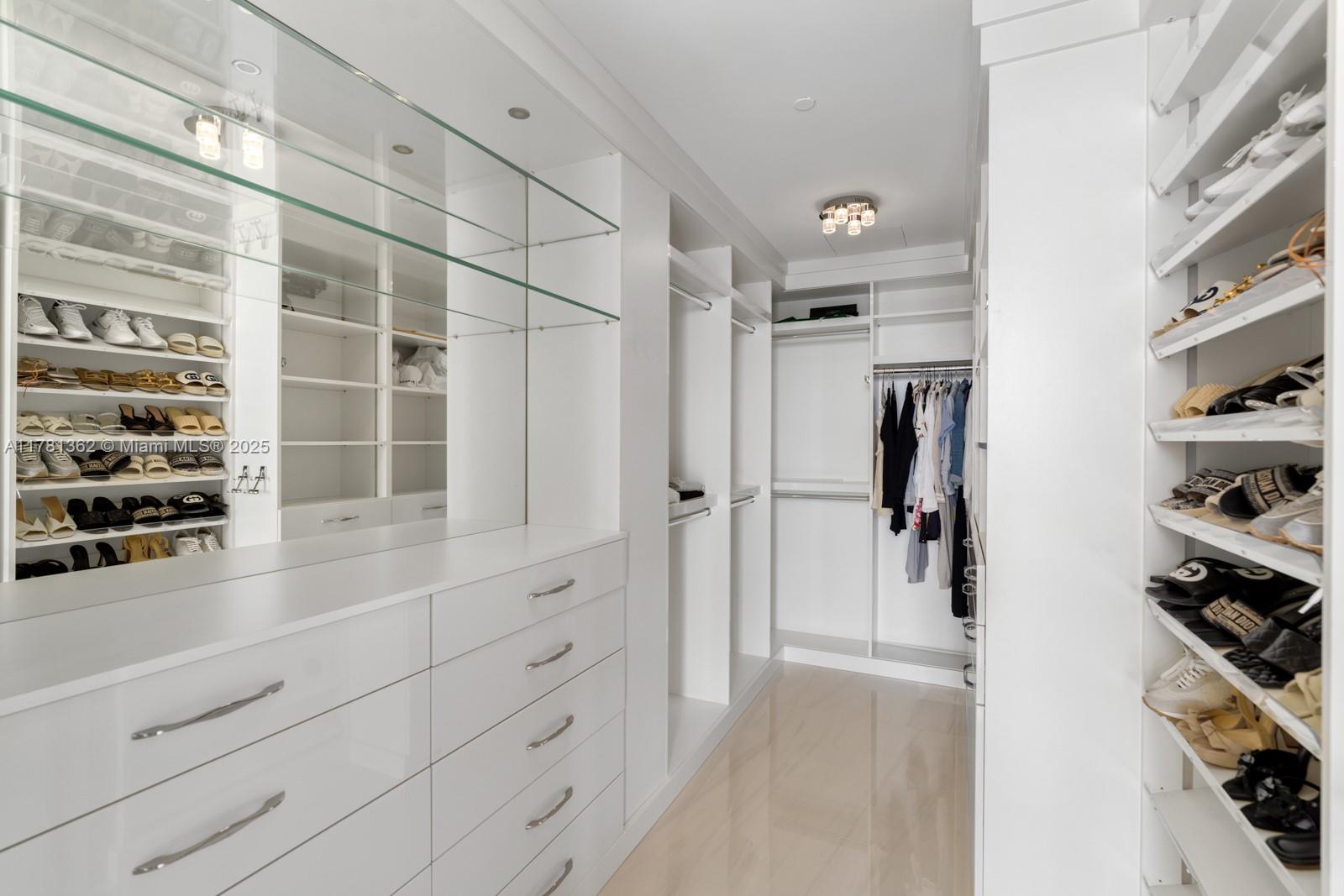 9705 Collins Avenue, Unit 2604N Bal Harbour, FL 33154 - Photo 19 of 42 a view of walk in closet with empty racks