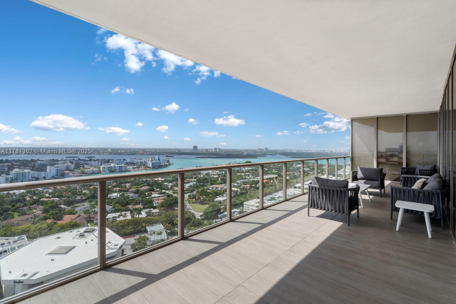9705 Collins Avenue, Unit 2604N Bal Harbour, FL 33154 - Photo 28 of 42 a view of a terrace with furniture