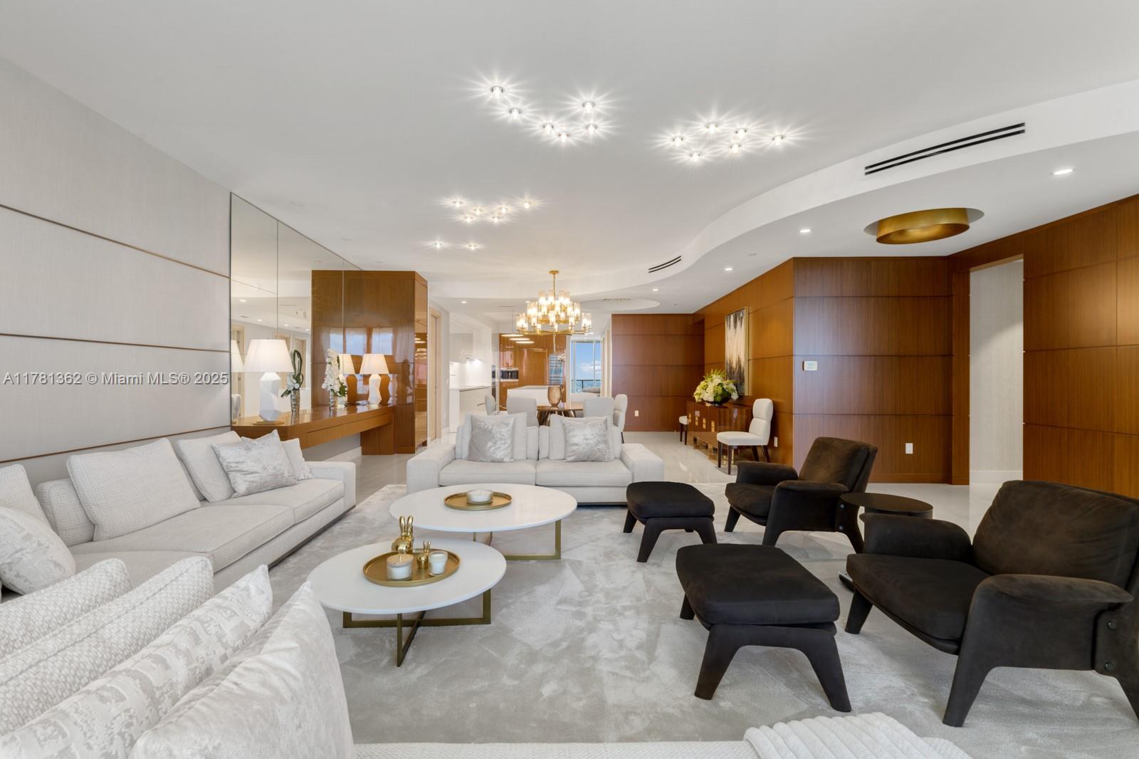 9705 Collins Avenue, Unit 2604N Bal Harbour, FL 33154 - Photo 10 of 42 a living room with furniture and a table