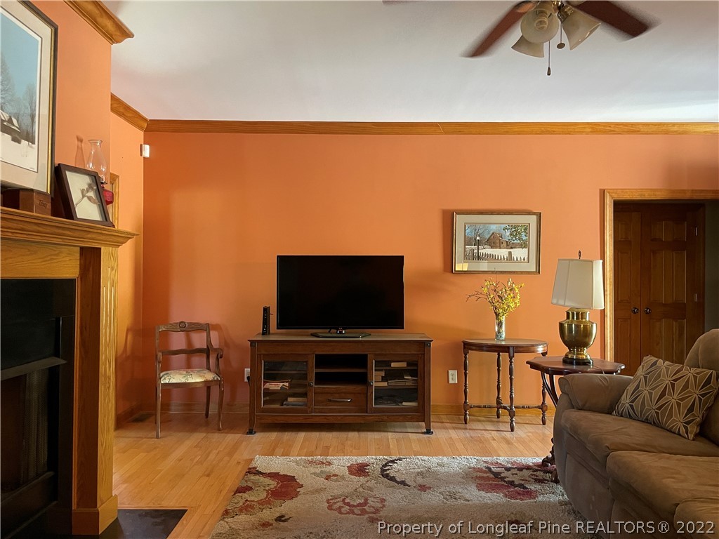 127 Doane Ranch Road Raeford, NC 28376 - Photo 15 of 47 a living room with furniture and a flat screen tv